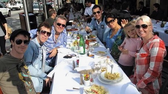 Chris Cheney, Slim Jim Phantom, Jimmy Barnes and their families hatched The Barnestormers at a LA lunch in 2010. Picture: Supplied / Chris Cheney