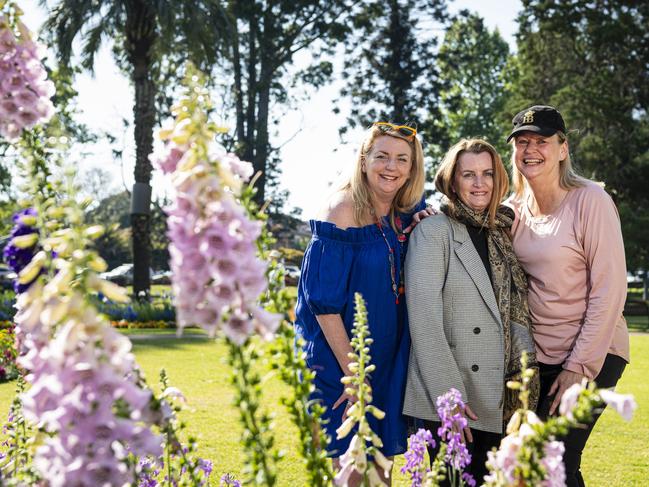 Admiring the flowers are (from left) Fiona Kingsford, Julie Appleby and Kath Boschen in Queens Park for Carnival of Flowers, Saturday, September 21, 2024. Picture: Kevin Farmer