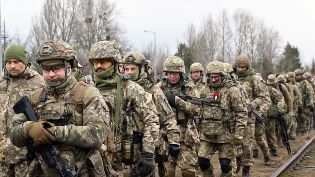 The military reserve of the Ukrainian Armed Forces takes part in a military drill outside Kyiv on Saturday. Picture: AFP