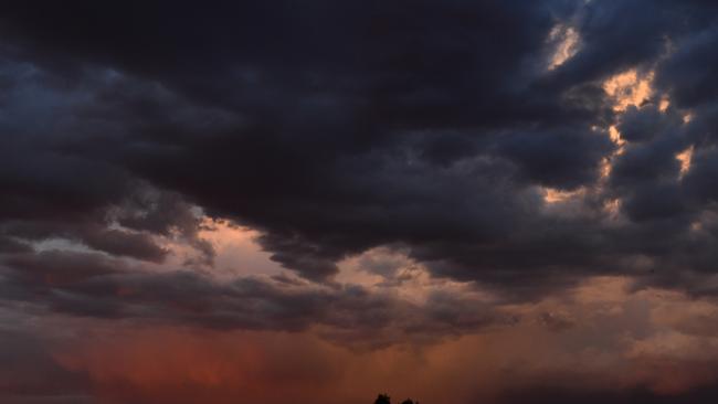 RAIN STILL TO FALL: Light rain is seen at sunset in the drought ravaged town of Stanthorpe, 180km south west of Brisbane, Thursday, October 3, 2019. (AAP Image/Mick Tsikas)