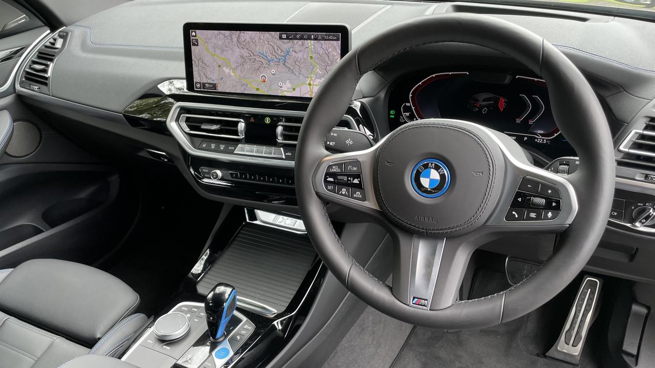 BMW’s iX3 plays it safe inside and out.