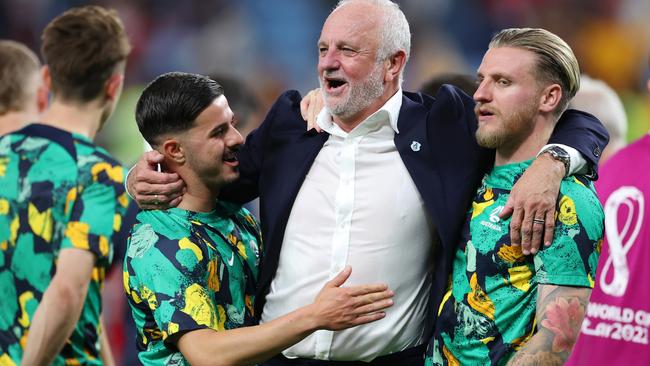 AL WAKRAH, QATAR - NOVEMBER 30: Graham Arnold, Head Coach of Australia, is congratulated by his players after their 1-0 victory in the FIFA World Cup Qatar 2022 Group D match between Australia and Denmark at Al Janoub Stadium on November 30, 2022 in Al Wakrah, Qatar. (Photo by Alex Grimm/Getty Images)