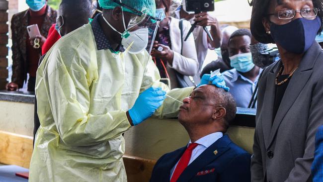 Zimbabwean Vice-President Constantino Chiwenga has a COVID-19 test before getting the Sinopharm Vaccine in Harare, Zimbabwe, last week. Picture: Getty Images