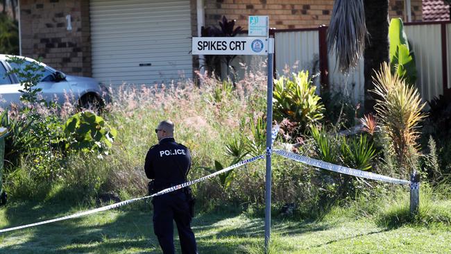 Police block the scene. Neighbours said they were shocked by the news. Picture: NIGEL HALLETT