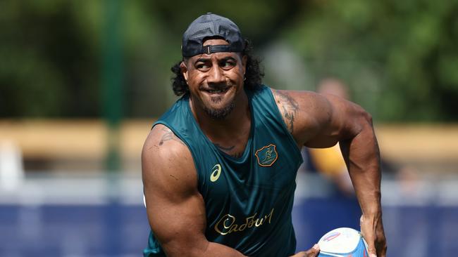 SAINT-ETIENNE, FRANCE - AUGUST 31: Pone Fa'amausili passes during an Australia Wallabies training session ahead of the Rugby World Cup France 2023, at Stade Roger Baudras on August 31, 2023 in Saint-Etienne, France. (Photo by Chris Hyde/Getty Images)