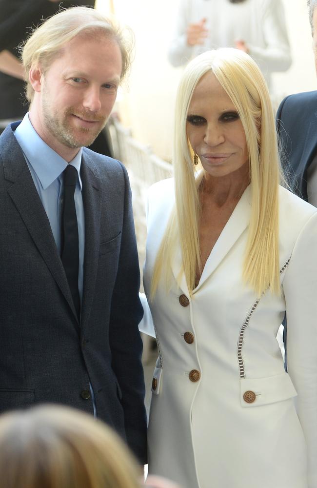 Donatella Versace and a guest attend the Anna Wintour Costume Center Grand Opening at the Metropolitan Museum of Art.