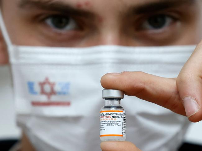 An Israeli medical nurse holds a vial of the Pfizer-BioNtech vaccine as the Jewish state struggles to contain the spread of the Omicron variant. Picture: AFP