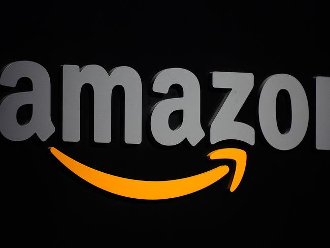 (FILES) This file photo taken on September 28, 2011 shows the Amazon logo in New York. Online giant Amazon must pay damages to consumers billed for app purchases by children on its tablets, a federal court has ruled, in a win for US regulators. The US Federal Trade Commission said April 27, 2016 the court backed its lawsuit, which argued that Amazon failed to get consent from parents whose children made in-app purchases on the Kindle and Fire tablets, sometimes racking up huge bills. / AFP PHOTO / EMMANUEL DUNAND