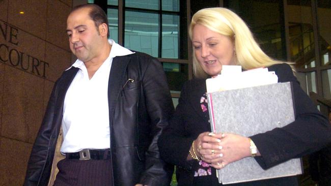 Tony Mokbel leaves Melbourne Magistrates’ Court with his lawyer, Nicola Gobbo.