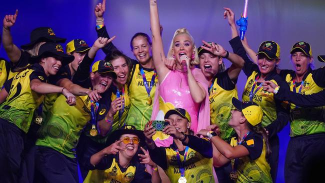 Katy Perry, performs on stage surrounded by the Australian women’s cricket team. Picture: AAP IMAGE/SCOTT BARBOUR