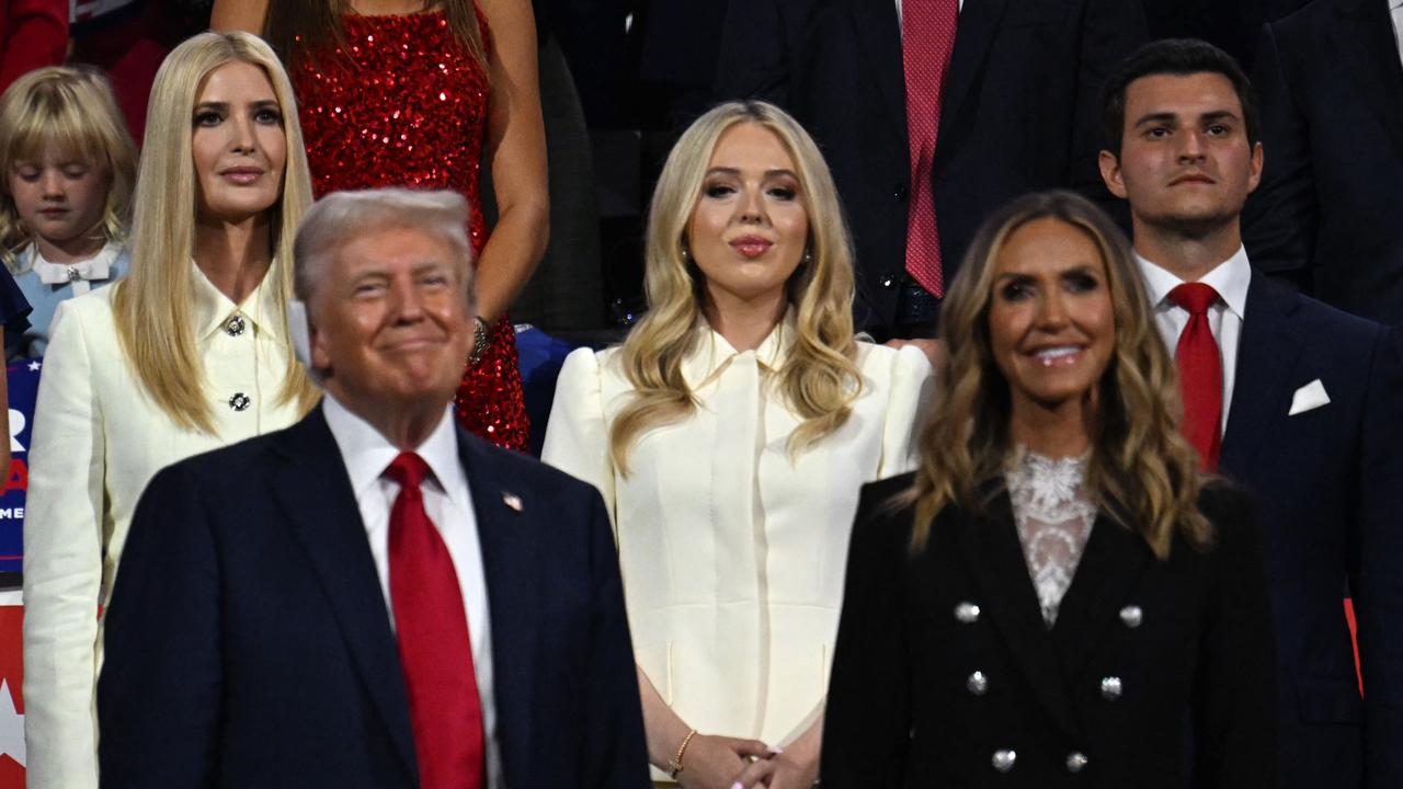 Donald Trump with his children Ivana and Tiffany Trump. Picture: AFP