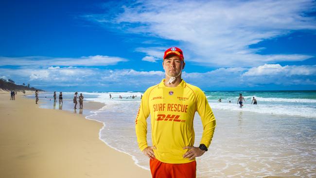 Queensland Volunteer Surf Life Saver Brenden Scoffell pictured on the beach. Picture: NIGEL HALLETT