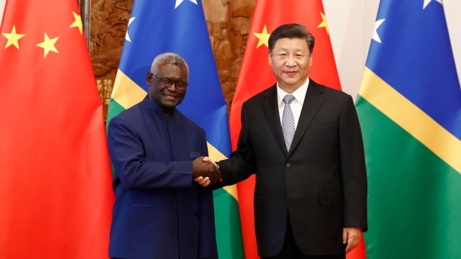 Chinese President Xi Jinping shakes hands with Prime Minister Manasseh Damukana Sogavare of the Solomon Islands in 2019. Picture: Sheng Jiapeng/China News Service/VCG via Getty Images