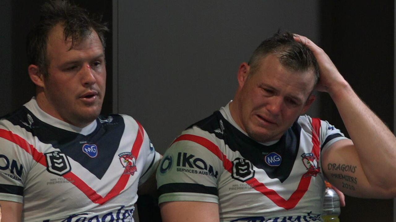 Josh Morris sits with his distraught brother Brett after the match. Picture: Fox League