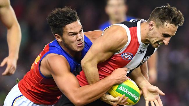 Cam Rayner wraps up Luke Dunstan in a tackle. Picture: Getty Images