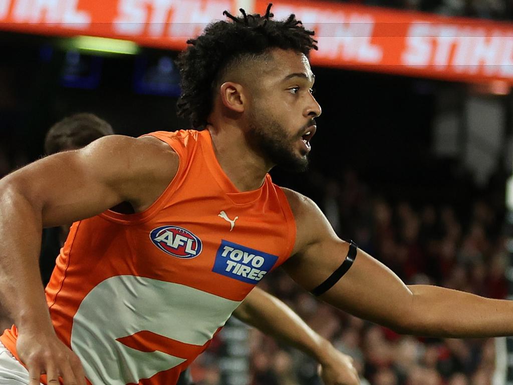 MELBOURNE, AUSTRALIA - MAY 11: Connor Idun of the Giants controls the ball during the round nine AFL match between Essendon Bombers and Greater Western Sydney Giants at Marvel Stadium, on May 11, 2024, in Melbourne, Australia. (Photo by Robert Cianflone/Getty Images)