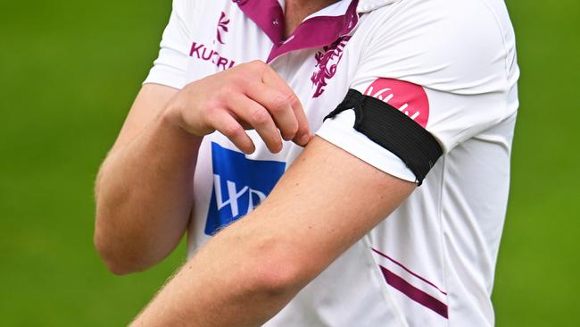 Players wore black armbands as a tribute to Baker in the County Championship. (Photo by Harry Trump/Getty Images)