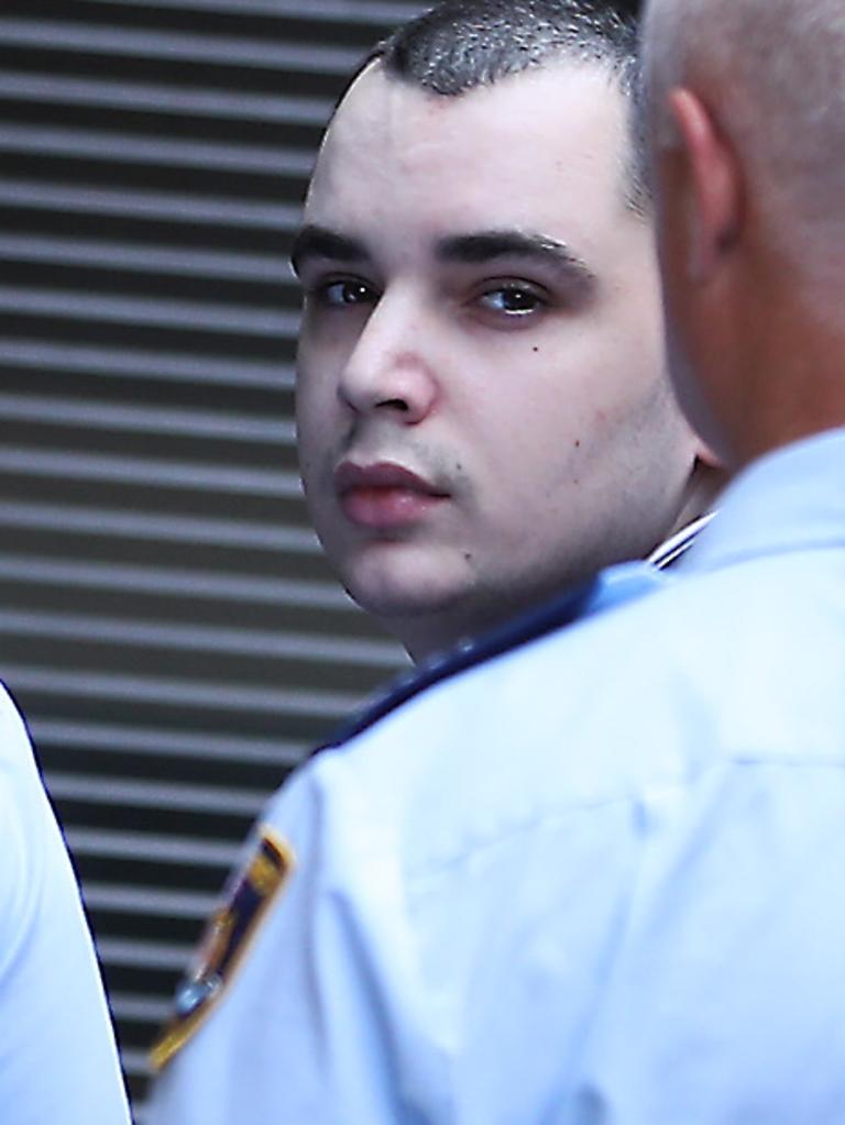 Mathew Flame being unloaded from a prison truck outside the NSW Supreme Court in Sydney. Picture: John Grainger