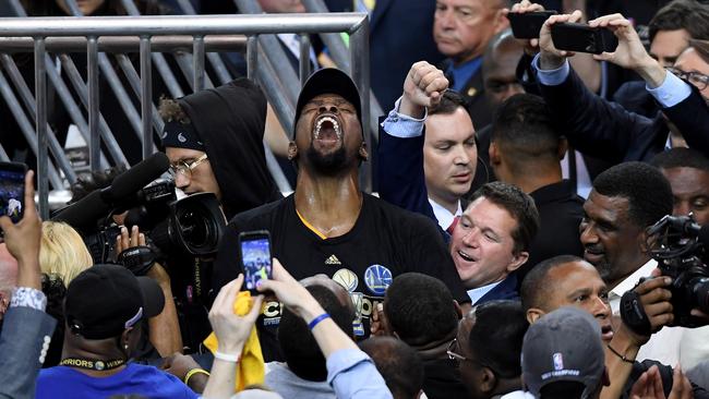 Kevin Durant is mobbed after the Warriors claimed the 2017 NBA title. Picture: Getty Images