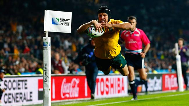 Matt Giteau went over late on for Australia’s third try of the night.