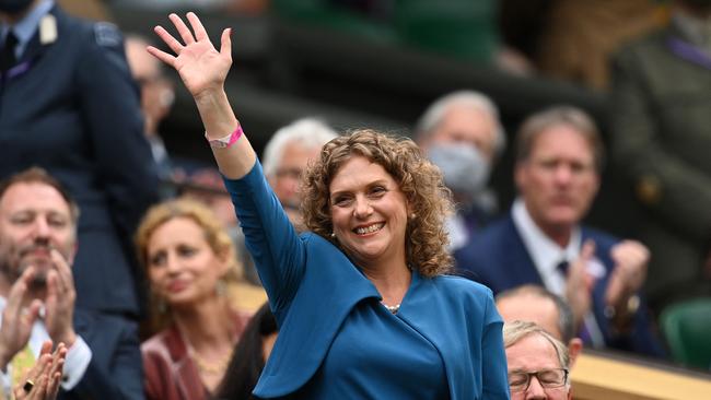 Hannah Ingram-Moore, the daughter of Captain Tom Moore, reacts from the Royal box as she waits ahead of the men's singles first round match between Serbia's Novak Djokovic and Britain's Jack Draper, under the closed roof on Centre Court, on the first day of the 2021 Wimbledon Championships.