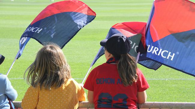 Young Dees fans show their support. The Melbourne Demons took on St Kilda at Traeger Park, Alice Springs, on June 1, 2025. Picture: Gera Kazakov