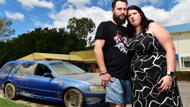 Corey Dawson and Seanne Breeding are the owners of the pictured car which was dumped in the Hyde Park lake after being stolen from their Gulliver home. Picture: Shae Beplate.