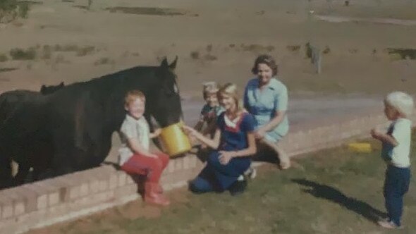 Dean Robinson, left, and Trent, right, with their grandmother and cousins. Source: Supplied