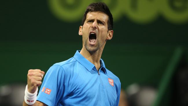 DOHA, QATAR — JANUARY 7: Novak Djokovic of Serbia reacts after winning a point against Andy Murray of Great Britain during the men's singles final match of the ATP Qatar Open tennis competition held at the Khalifa International Tennis Complex on January 7, 2017 in Doha, Qatar. (Photo by AK BijuRaj/Getty Images)