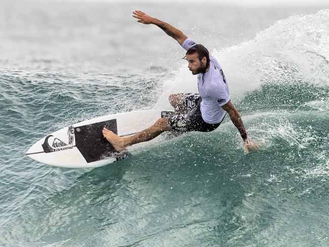 Mikey Wright in action in round one of the Quiksliver Pro at Snapper Rocks.