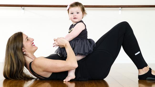 Natalie Bird Cassidy started taking Delphine, 11 months, to classes when bub was eight weeks old. Picture: Justin Lloyd