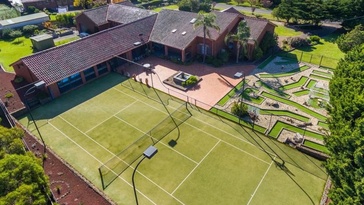 The 18-hole course sits alongside a tennis court, basketball hoop and more.