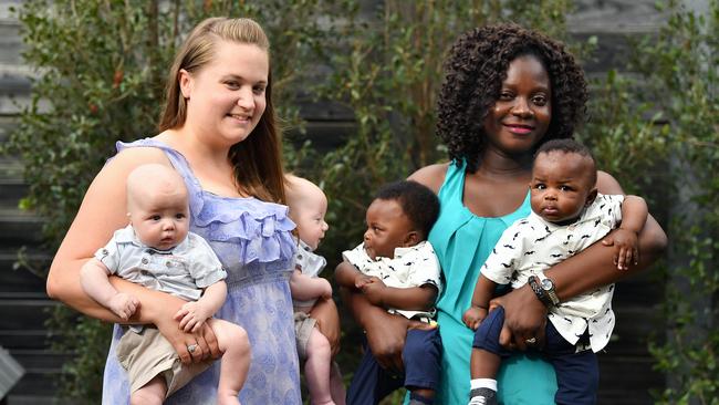 Anita Leggatt with her twin boys Noah and Hunter and Lola Oluwoye holding her boys Josiah and Jordan. They have connected with other families through Southern Sydney Multiple Birth Association. Picture: Joel Carrett