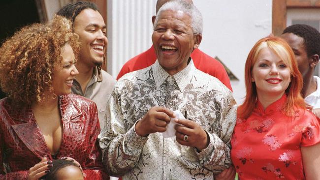 Geri Halliwel (right) wore a qipao when the Spice Girls met South Africa's late President Nelson Mandela in 1997.(Pic: John Stillwell)