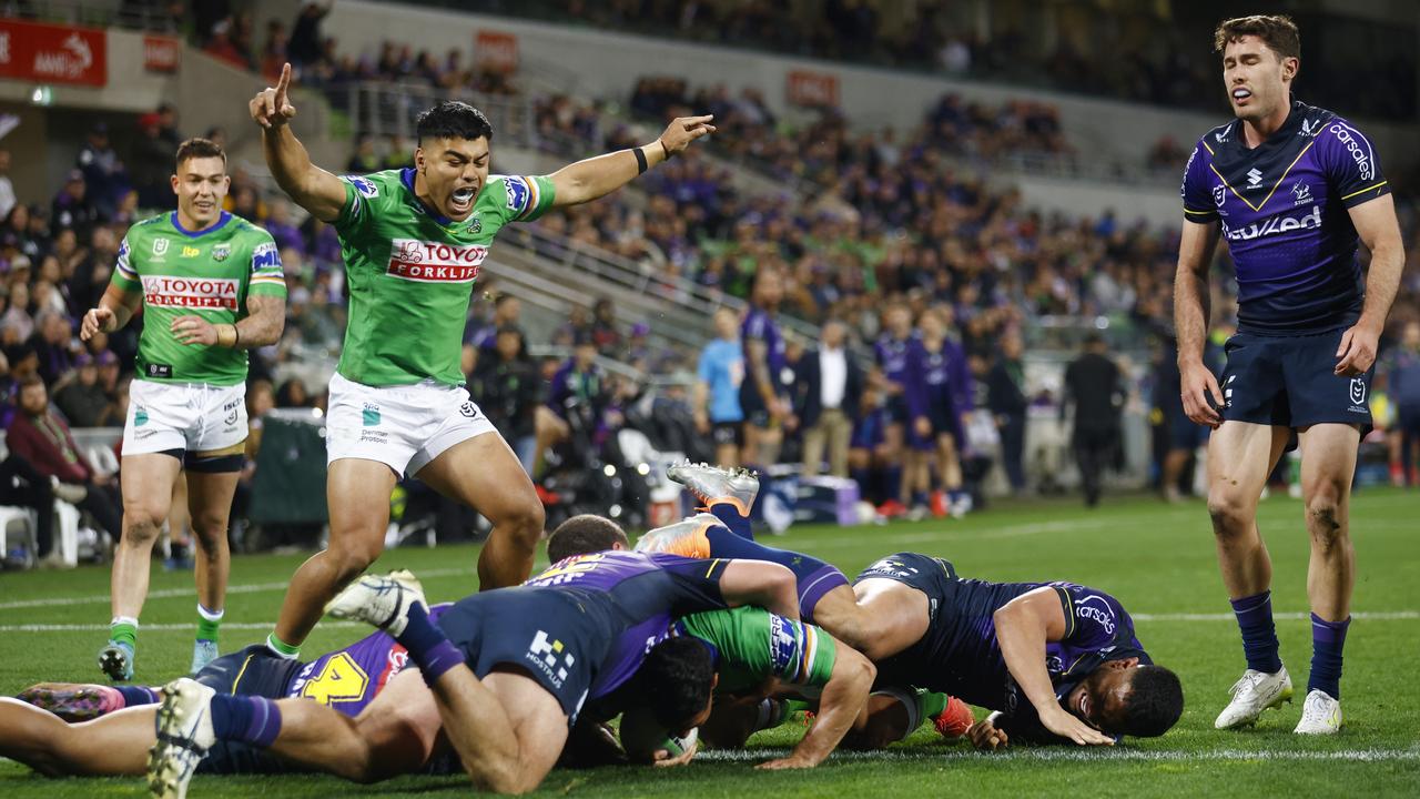 Jamal Fogarty scores against the Storm on Saturday night. Picture: Daniel Pockett/Getty