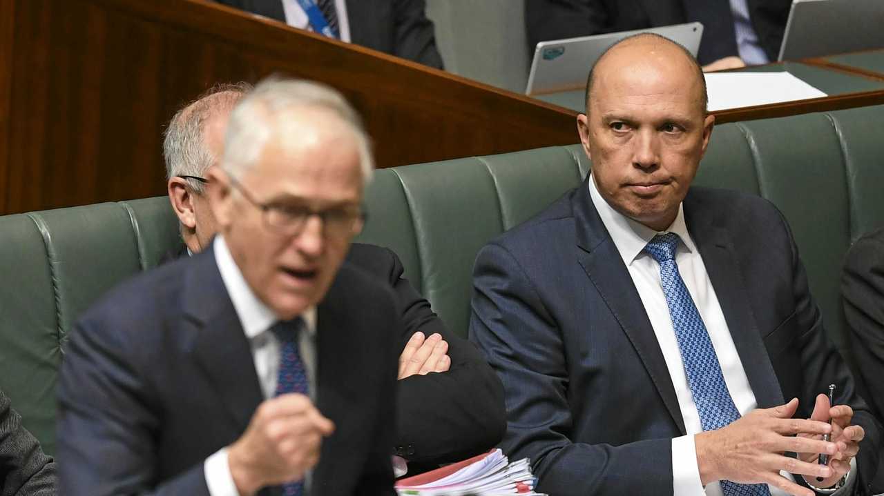 ATTEMPTED SPILL: Australian Home Affairs Minister Peter Dutton behind Australian Prime Minister Malcolm Turnbull. Picture: LUKAS COCH