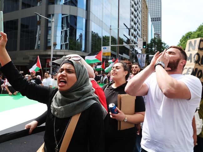 Thousands of protesters have converged on Sydney Town Hall. Picture: David Swift