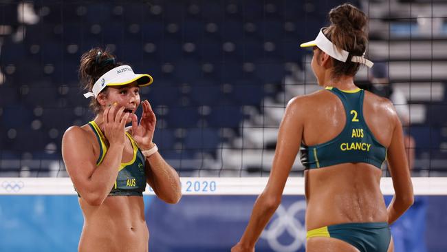 Mariafe Artacho del Solar and Taliqua Clancy react after defeating Canada in their beach volleyball quarter-final. Picture: Getty Images