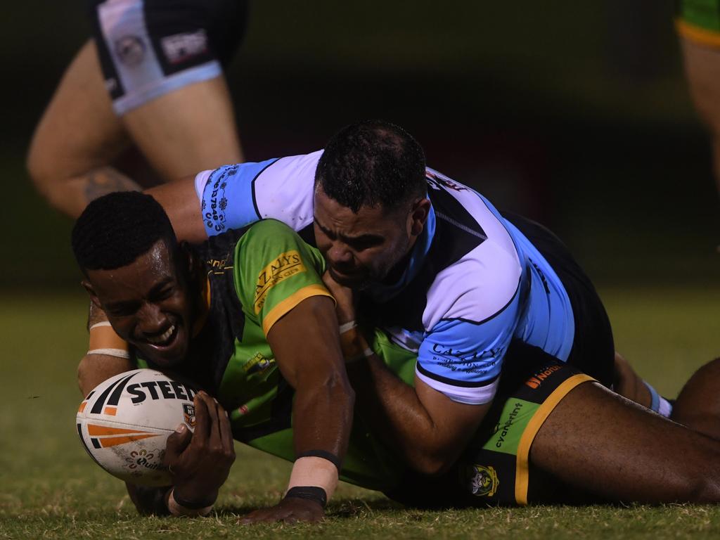 Tevita Kanalagi is tackled in the NRLNT Grand Final 2022. Picture: (A)manda Parkinson