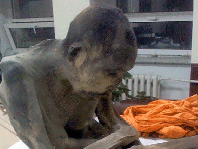 CREDIT: Morning News Online use only These are the amazingly intact remains of a monk meditating that have lay undiscovered since sometime in the 1800s. The discovery of the man sat in the lotus position has sparked a forensic investigation into the unknown religious devotee - with experts' initial evaluation suggesting the mummified remains are at least 200 years old. The human relic, which had been preserved in animal skin, was found this week in Songinokhairkhan province, according to Mongolia's Morning Newspaper.