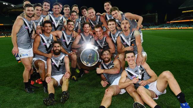 Port Adelaide celebrates with the Showdown Shield. (Photo by Mark Brake/Getty Images)