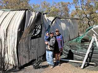 Peter Patti with sons Brock and Cruze. The Patti's are lucky to have a house still with one family member calling it 'a miracle'. Picture: Contributed