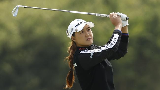 Minjee Lee follows the flight of her shot. Picture: Getty Images.