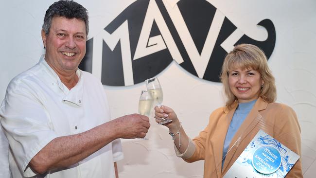 Mavs owners Milton Mavromoustakos and Julia Ryabova celebrate being crowned Victoria's best Greek restaurant or the third year in a row. Picture: Alison Wynd