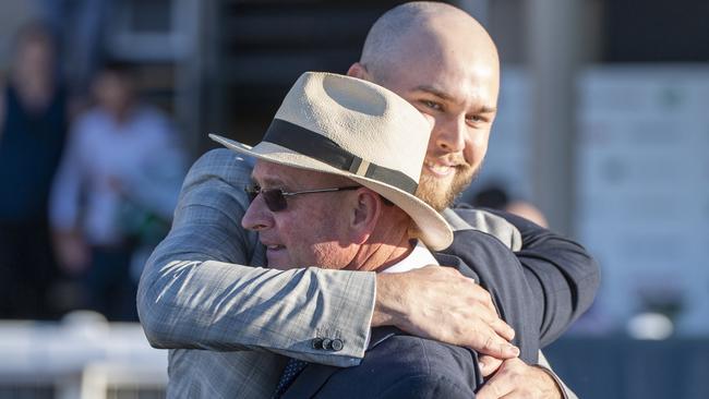 Toby and Trent Edmonds celebrate their first Group 1 win with Tyzone. Picture: AAP