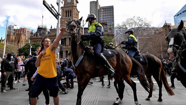 Crazy times: a scene from the lockdown protest in Sydney in July. Picture: AFP