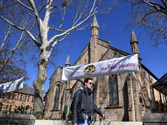 A sydney church displays a banner in support of marriage equality. Picture: AFP/Saeed Khan