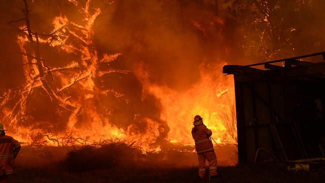 The fire approaches property in Bilpin, in the Blue Mountains. Picture: Jeremy Piper