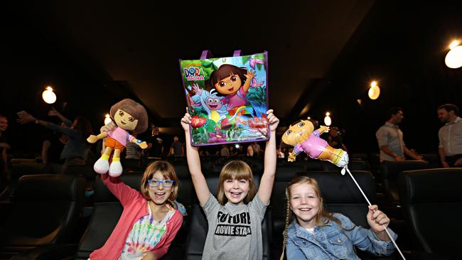 Kids Georgie Jacobs 8yrs from the Gold Coast, Bella Rose 11yrs from Brisbane and Charlotte Stent 9yrs from Brisbane at the cinemas in the Myer centre with the Premier. Pic Annette Dew
