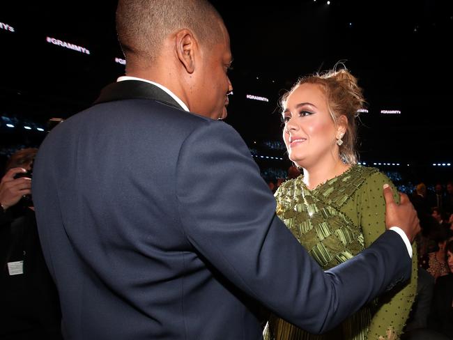 Jay-Z and Adele during The 59th GRAMMY Awards at STAPLES Center on February 12, 2017 in Los Angeles, California. Picture: Getty